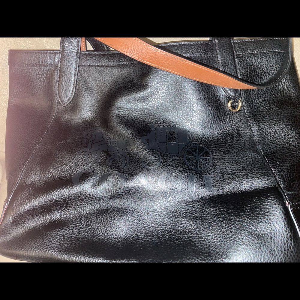 Coach leather purse.